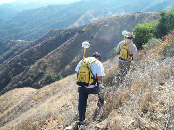 [ photograph of student GPS team collecting elevation data in the 
San Dimas Experimental Forest, 2003 ]