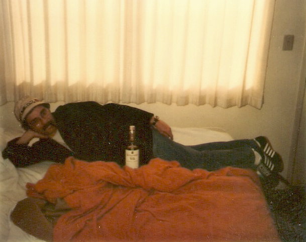 [ Dave in Motel 6 with Jack Daniels, by Jon Voorhees ]